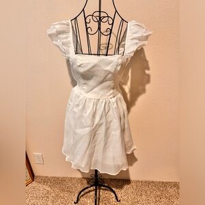 White dress with blue bow